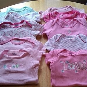 10 gently used 0-3 mo onesies